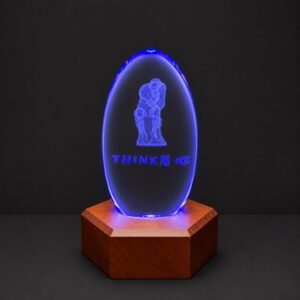 Custom Oval Crystal Laser Engraved Art Sculpture with LED Wooden Base | Personalized 3D Engraved Crystal Gift | OEM & ODM Crystal Souvenir Manufacturer